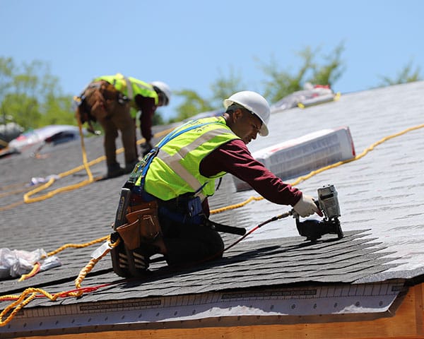 Roof replacement contractor installing a residential roof in Hollywood FL